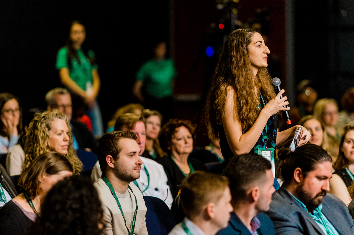 An attendee asks a question of Kaitlin Yarnall after her keynote.